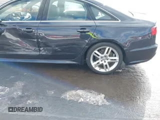 2016 Audi A6 Premium Plus with VIN WAUGFAFC9GN014767, listed as a IAAI auction lot 41508275 with 113,167 mi miles and . Bid and sale history available at DreamBid. Image 17.