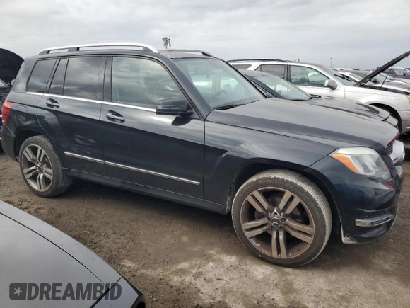 2014 Mercedes-Benz GLK 350 with VIN WDCGG5HB1EG172625, listed as a Copart auction lot 76698554 with 134,797 mi miles and Salvage Title. Bid and sale history available at DreamBid. Image 4.