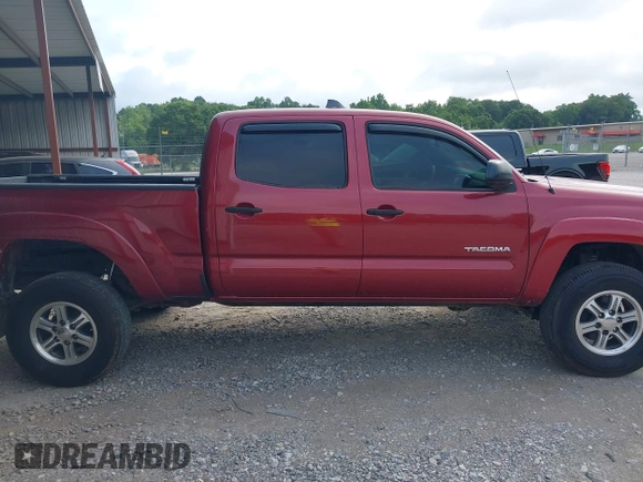 2014 Toyota Tacoma with VIN 3TMMU4FN8EM068048, listed as a IAAI auction lot 42633506 with 126,339 mi miles and . Bid and sale history available at DreamBid. Image 13.