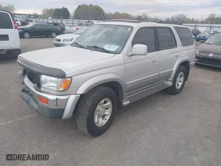 1997 Toyota 4Runner Limited with VIN JT3GN87R2V0024833, listed as a IAAI auction lot 41881359 with 179,115 mi miles. Bid and sale history available at carsss.com. Image 2.