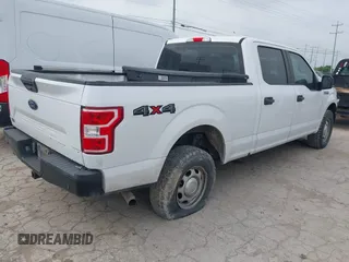 2018 Ford F-150 XL with VIN 1FTFW1E54JKE94386, listed as a IAAI auction lot 42135217 with 198,458 mi miles. Bid and sale history available at carsss.com. Image 4.