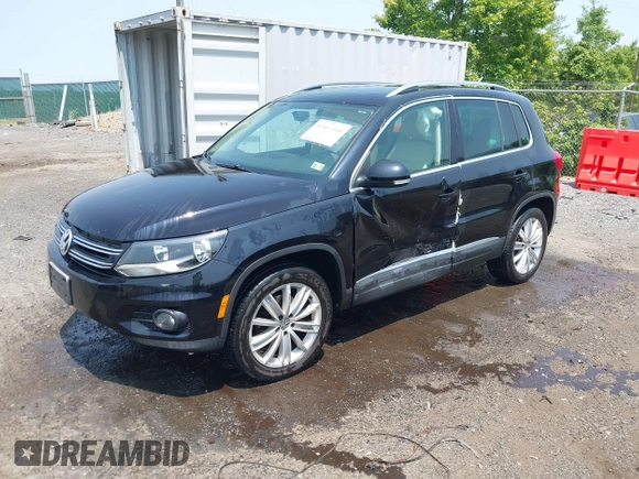 2012 Volkswagen Tiguan SE z VIN WVGBV7AX1CW548133, wystawiony jako IAAI lot #42403164 z przebiegiem 139 083 mil mil oraz . Historia ofert i sprzedaży dostępna na DreamBid. Obrazek 2.