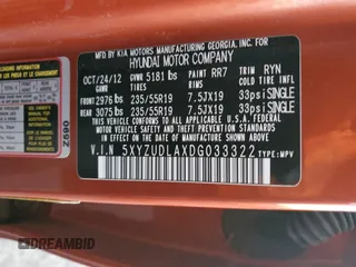 2013 Hyundai Santa Fe Sport z VIN 5XYZUDLAXDG033322, wystawiony jako Copart lot #84943624 z przebiegiem 242 567 mil mil oraz Szkoda całkowita • Salvage title. Historia ofert i sprzedaży dostępna na DreamBid. Obrazek 13.