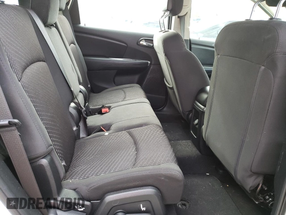 2015 Dodge Journey SE z VIN 3C4PDCABXFT595441, wystawiony jako Copart lot #59181825 z przebiegiem 122 263 mil mil oraz Szkoda całkowita • Salvage title. Historia ofert i sprzedaży dostępna na DreamBid. Obrazek 11.