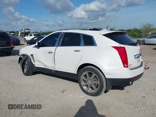 2011 Cadillac SRX Performance Collection z VIN 3GYFNBEYXBS543819, wystawiony jako IAAI lot #42159051 z przebiegiem Nie podano mil oraz . Historia ofert i sprzedaży dostępna na DreamBid. Obrazek 3.