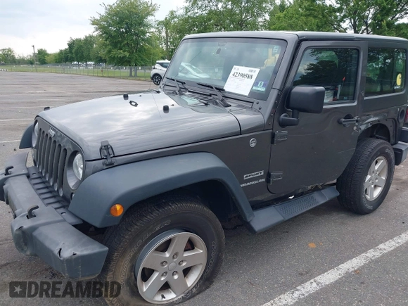 2016 Jeep Wrangler Willys Wheeler with VIN 1C4GJWAG2GL318981, listed as a IAAI auction lot 42390588 with 131,559 mi miles and . Bid and sale history available at DreamBid. Image 2.