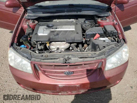 2005 Kia Spectra LX z VIN KNAFE121355162932, wystawiony jako Copart lot #56292625 z przebiegiem 92 828 mil mil oraz Szkoda całkowita • Salvage title. Historia ofert i sprzedaży dostępna na DreamBid. Obrazek 11.