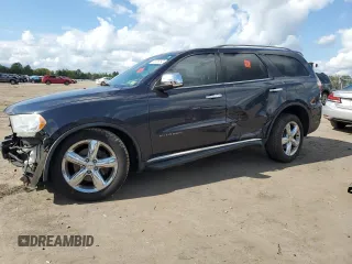 2013 Dodge Durango Citadel with VIN 1C4SDHET6DC592944, listed as a Copart auction lot 74306054 with 87,025 mi miles and Salvage Title. Bid and sale history available at carsss.com. Image 1.