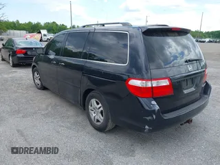 2005 Honda Odyssey EX-L with VIN 5FNRL38775B085512, listed as a IAAI auction lot 42128261 with Not Provided miles and . Bid and sale history available at DreamBid. Image 3.