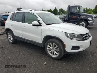 2017 Volkswagen Tiguan Wolfsburg Edition with VIN WVGRV7AX0HK003389, listed as a Copart auction lot 59709615 with 88,491 mi miles and Salvage title. Bid and sale history available at DreamBid. Image 4.