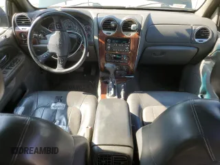 2003 GMC Envoy SLT with VIN 1GKDT13S032396374, listed as a Copart auction lot 74675134 with 115,280 mi miles and Salvage Title. Bid and sale history available at carsss.com. Image 8.