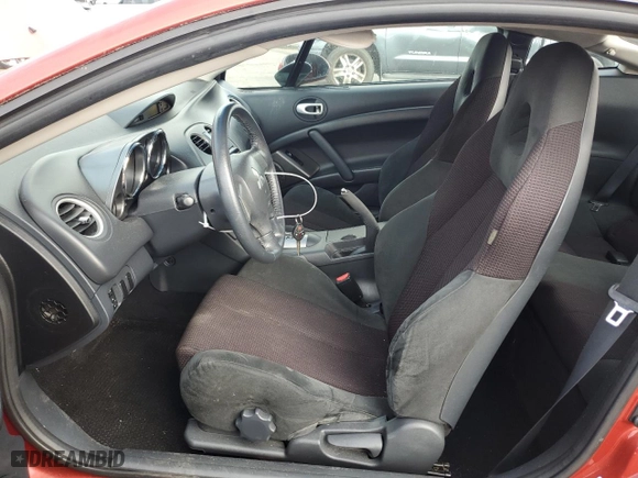 2009 Mitsubishi Eclipse GS with VIN 4A3AK24F89E029994, listed as a Copart auction lot 71643034 with 177874 miles and Salvage Title. Bid and sale history available at carsss.com. Image 7.