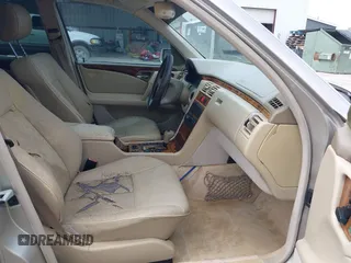1999 Mercedes-Benz E-Class with VIN WDBJF65H9XA799820, listed as a IAAI auction lot 41959156 with 150,133 mi miles. Bid and sale history available at carsss.com. Image 5.