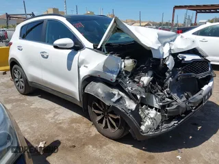 2019 Kia Sportage EX with VIN KNDPNCAC4K7507973, listed as a IAAI auction lot 42386130 with 124,319 mi miles and . Bid and sale history available at DreamBid. Image 1.