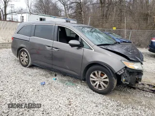 2014 Honda Odyssey EX-L with VIN 5FNRL5H67EB006410, listed as a Copart auction lot 47461745 with 133,774 mi miles and Salvage Title. Bid and sale history available at DreamBid. Image 4.