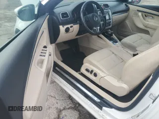 2011 Volkswagen Eos Komfort with VIN WVWBW7AH2BV003170, listed as a Copart auction lot 55771285 with 129,847 mi miles and Salvage Title. Bid and sale history available at DreamBid. Image 8.