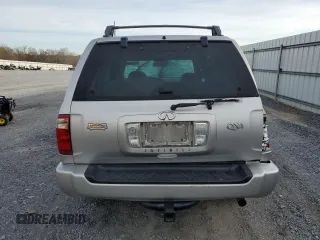 2003 Infiniti QX4 Luxury z VIN JNRDR09Y33W301556, wystawiony jako Copart lot #47765914 z przebiegiem Nie podano mil oraz Szkody całkowita. Historia ofert i sprzedaży dostępna na DreamBid. Obrazek 6.