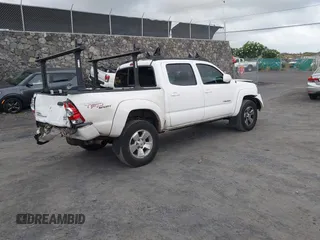 2010 Toyota Tacoma PreRunner z VIN 3TMJU4GN8AM103120, wystawiony jako IAAI lot #42226797 z przebiegiem 237 153 mil mil oraz . Historia ofert i sprzedaży dostępna na DreamBid. Obrazek 4.