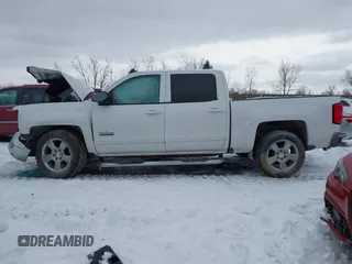 2018 Chevrolet Silverado 1500 LT with VIN 3GCPCREC6JG195189, listed as a IAAI auction lot 41613074 with Not Provided miles and . Bid and sale history available at DreamBid. Image 14.