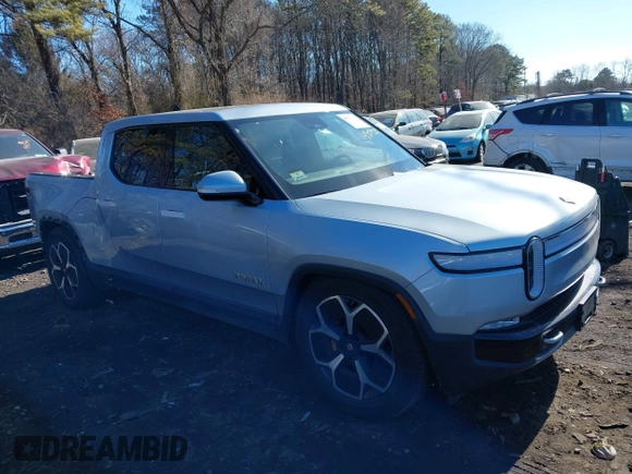 2022 Rivian R1T Adventure Package with VIN 7FCTGAAA1NN012328, listed as a IAAI auction lot 41307929 with 13,588 mi miles. Bid and sale history available at carsss.com. Image 13.