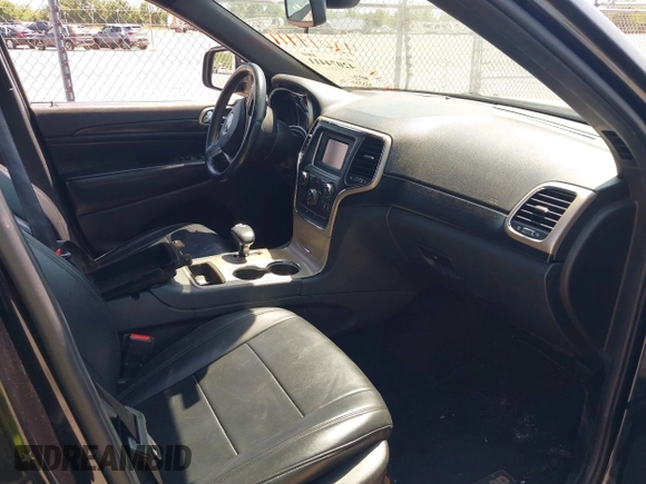 2014 Jeep Grand Cherokee Laredo with VIN 1C4RJEAG9EC157383, listed as a IAAI auction lot 42074411 with 213,566 mi miles and . Bid and sale history available at DreamBid. Image 5.
