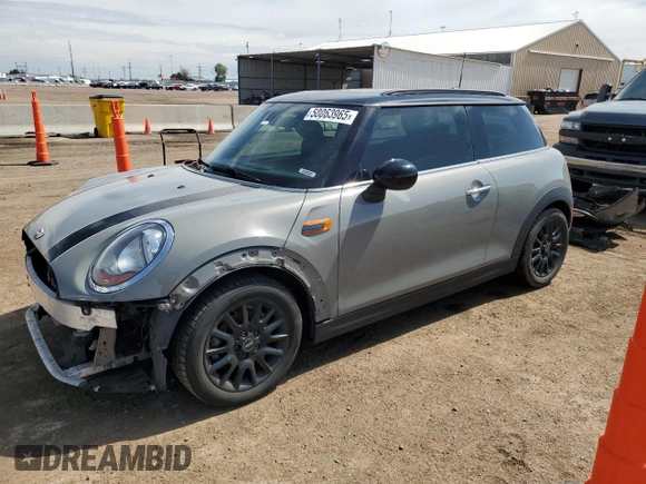 2015 MINI Hardtop with VIN WMWXM5C5XFT974077, listed as a Copart auction lot 58063965 with 93,853 mi miles and Salvage title. Bid and sale history available at DreamBid. Image 1.