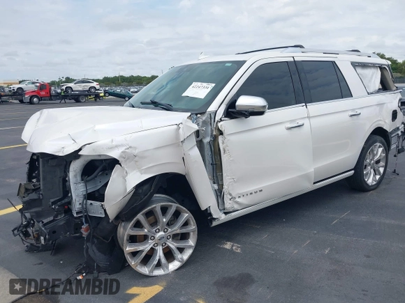 2019 Ford Expedition Max Platinum with VIN 1FMJK1LT3KEA56753, listed as a IAAI auction lot 42247331 with 73,909 mi miles and . Bid and sale history available at DreamBid. Image 2.