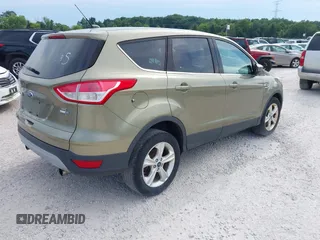 2013 Ford Escape SE with VIN 1FMCU9GX7DUC32369, listed as a IAAI auction lot 42144967 with 156,275 mi miles and . Bid and sale history available at DreamBid. Image 4.