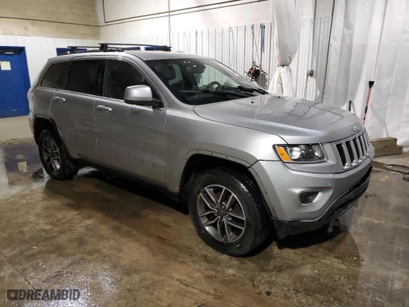 2015 Jeep Grand Cherokee Laredo with VIN 1C4RJFAG2FC828769, listed as a Copart auction lot 86611744 with 84,616 mi miles and Salvage Title. Bid and sale history available at carsss.com. Image 4.