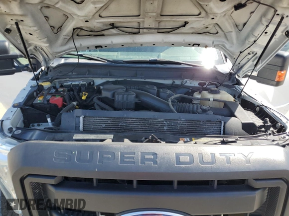 2014 Ford F-250 XL with VIN 1FT7X2B64EEB66846, listed as a Copart auction lot 57212565 with 261,721 mi miles and Salvage title. Bid and sale history available at DreamBid. Image 11.