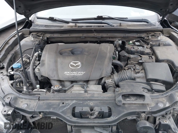 2014 Mazda 3 S Touring with VIN JM1BM1L35E1208952, listed as a IAAI auction lot 42121077 with 183,985 mi miles and . Bid and sale history available at carsss.com. Image 10.