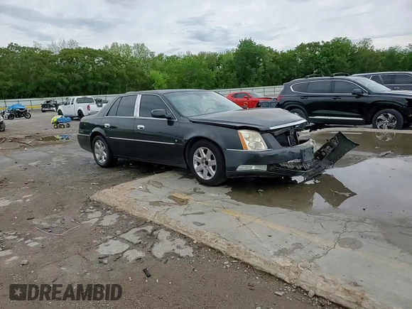 2007 Cadillac DTS V8 z VIN 1G6KD57Y27U179010, wystawiony jako Copart lot #54055605 z przebiegiem 137 326 mil mil oraz Szkoda całkowita • Salvage title. Historia ofert i sprzedaży dostępna na DreamBid. Obrazek 14.