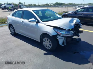 2023 Kia Rio S z VIN 3KPA24AD4PE592446, wystawiony jako IAAI lot #42244022 z przebiegiem 13 759 mil mil oraz . Historia ofert i sprzedaży dostępna na DreamBid. Obrazek 1.
