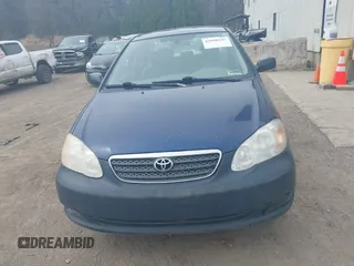 2008 Toyota Corolla CE with VIN 1NXBR32E98Z997007, listed as a IAAI auction lot 42090245 with 115,384 mi miles. Bid and sale history available at carsss.com. Image 6.