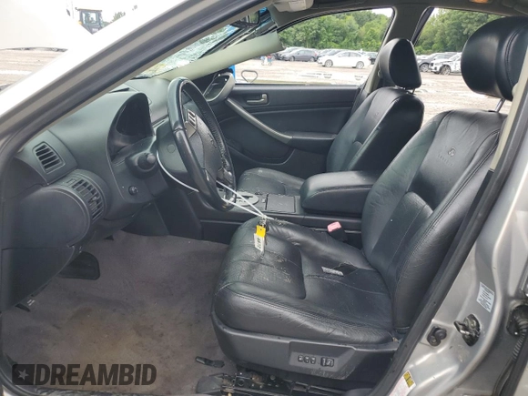 2004 Infiniti G35 w/Leather with VIN JNKCV51F24M716832, listed as a Copart auction lot 66197834 with 135,180 mi miles and Clean Title. Bid and sale history available at DreamBid. Image 7.