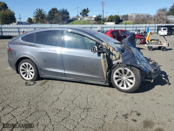 2020 Tesla Model X Long Range with VIN 5YJXCBE25LF238623, listed as a Copart auction lot 89015215 with 54,734 mi miles and Salvage Title. Bid and sale history available at carsss.com. Image 4.