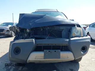2012 Nissan Xterra X with VIN 5N1AN0NU8CC523668, listed as a IAAI auction lot 41821919 with 243,035 mi miles and . Bid and sale history available at DreamBid. Image 6.