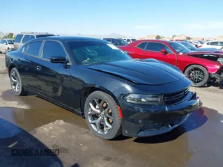 2015 Dodge Charger SXT z VIN 2C3CDXHG5FH784907, wystawiony jako IAAI lot #42322979 z przebiegiem 73 485 mil mil oraz . Historia ofert i sprzedaży dostępna na DreamBid. Obrazek 1.