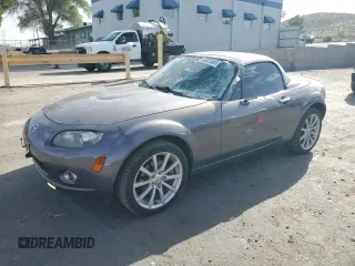 2007 Mazda MX-5 Miata Grand Touring with VIN JM1NC26F670134204, listed as a Copart auction lot 60828665 with 49,221 mi miles and Salvage title. Bid and sale history available at DreamBid. Image 1.