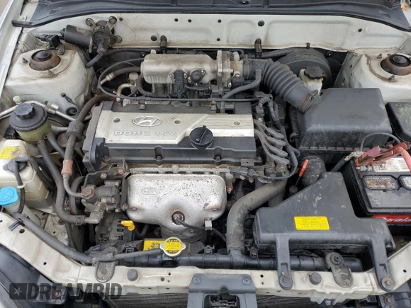 2005 Hyundai Accent GLS with VIN KMHCG45C45U631414, listed as a Copart auction lot 73963814 with 106,617 mi miles and Salvage Title. Bid and sale history available at carsss.com. Image 13.