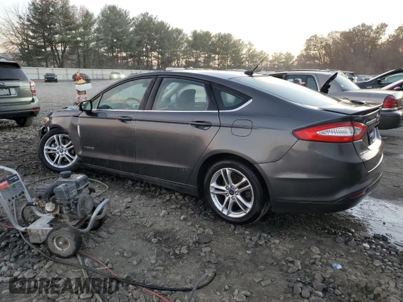 2016 Ford Fusion SE Hybrid with VIN 3FA6P0LU5GR127038, listed as a Copart auction lot 79508174 with 56,555 mi miles and Salvage Title. Bid and sale history available at carsss.com. Image 2.