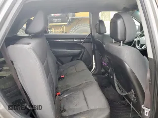 2012 Kia Sorento LX z VIN 5XYKT3A6XCG220216, wystawiony jako Copart lot #57467095 z przebiegiem 116 672 mil mil oraz Szkoda całkowita • Salvage title. Historia ofert i sprzedaży dostępna na DreamBid. Obrazek 10.