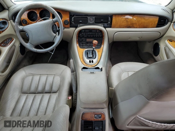 1998 Jaguar XJ with VIN SAJHX1248WC835728, listed as a Copart auction lot 86698244 with 116,768 mi miles and Clean title. Bid and sale history available at DreamBid. Image 8.