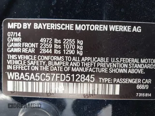 2015 BMW 5 Series 528i with VIN WBA5A5C57FD512845, listed as a IAAI auction lot 41954256 with 174,944 mi miles. Bid and sale history available at carsss.com. Image 9.
