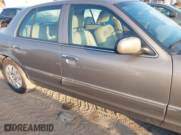 2004 Mercury Grand Marquis GS with VIN 2MEFM74WX4X696703, listed as a IAAI auction lot 42171970 with 149,556 mi miles and . Bid and sale history available at DreamBid. Image 18.