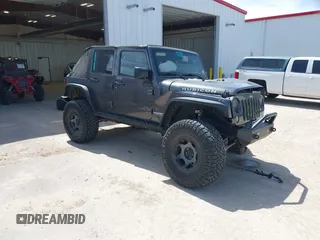2014 Jeep Wrangler Unlimited Rubicon with VIN 1C4BJWFG2EL279938, listed as a IAAI auction lot 41920729 with 76,418 mi miles and . Bid and sale history available at DreamBid. Image 1.