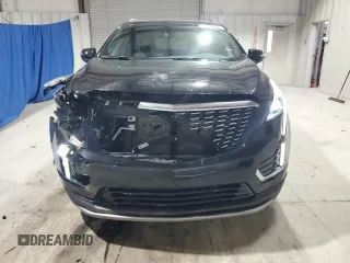 2025 Cadillac XT5 AWD Premium Luxury z VIN 1GYKNDRS0SZ119763, wystawiony jako Copart lot #57577715 z przebiegiem 10 682 mil mil oraz Tytuł czysty. Historia ofert i sprzedaży dostępna na DreamBid. Obrazek 5.