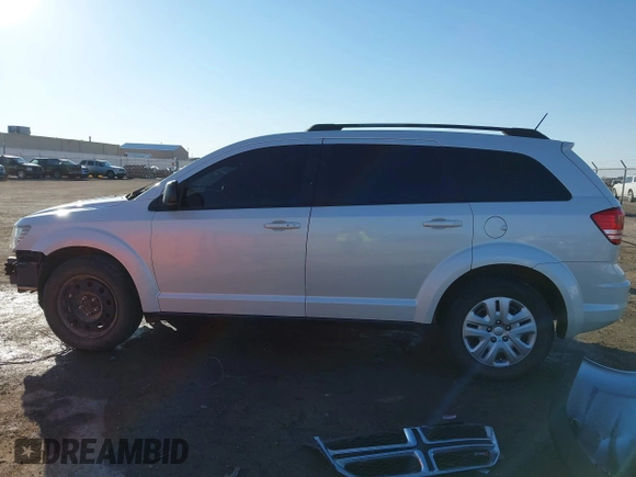 2017 Dodge Journey SE z VIN 3C4PDCAB3HT707029, wystawiony jako IAAI lot #41406306 z przebiegiem 104 046 mil mil oraz . Historia ofert i sprzedaży dostępna na DreamBid. Obrazek 15.