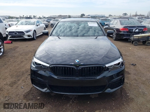 2019 BMW 5 Series 530e with VIN WBAJA9C59KB389304, listed as a IAAI auction lot 41562928 with 64,137 mi miles and . Bid and sale history available at DreamBid. Image 12.