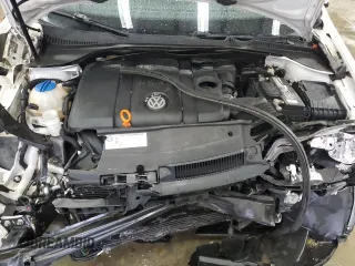 2010 Volkswagen Jetta SE with VIN 3VWTX7AJ8AM685028, listed as a Copart auction lot 83465474 with 99,943 mi miles and Salvage title. Bid and sale history available at DreamBid. Image 11.